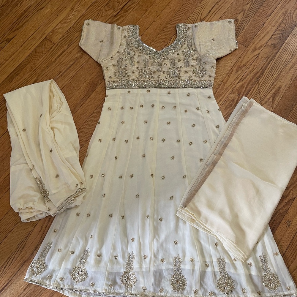 Off white Anarkali suit,brand new,never worn .